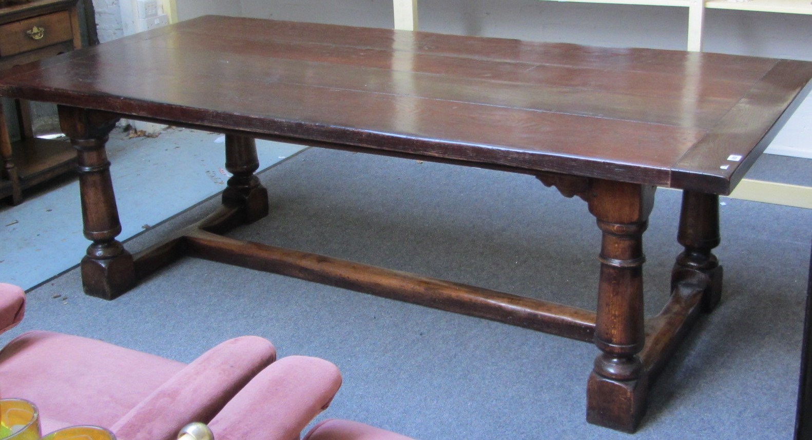 Appraisal: A th style oak refectory table the cleated plank top