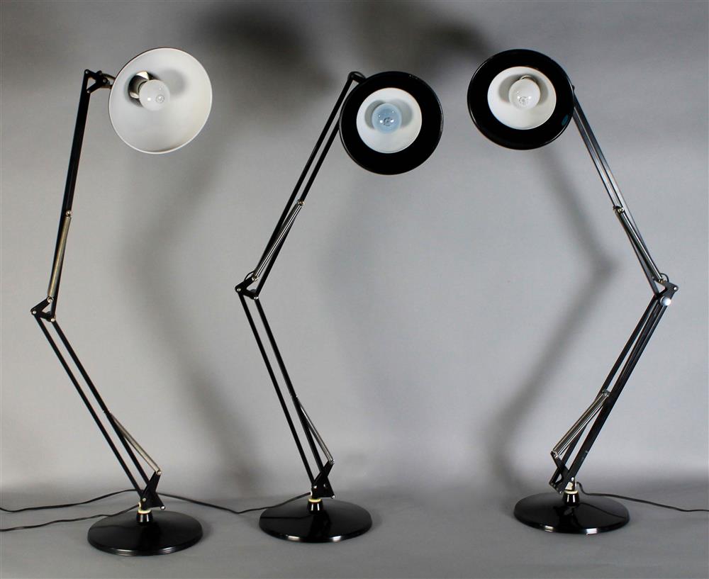 Appraisal: THREE MODERN BLACK METAL EXTENSION TABLE LAMPS WITH WEIGHTED BASES