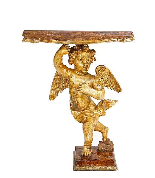 Appraisal: An Italian Baroque silver gilt and faux tortoiseshell putto form