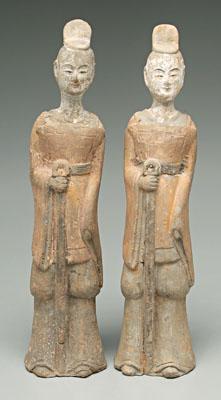 Appraisal: Two Chinese pottery figures gray clay body military officers remnants