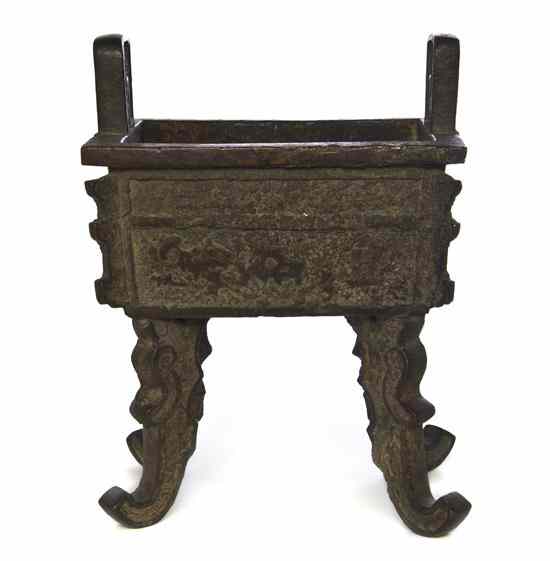 Appraisal: A Chinese Bronze Food Vessel of rectangular form flanked by