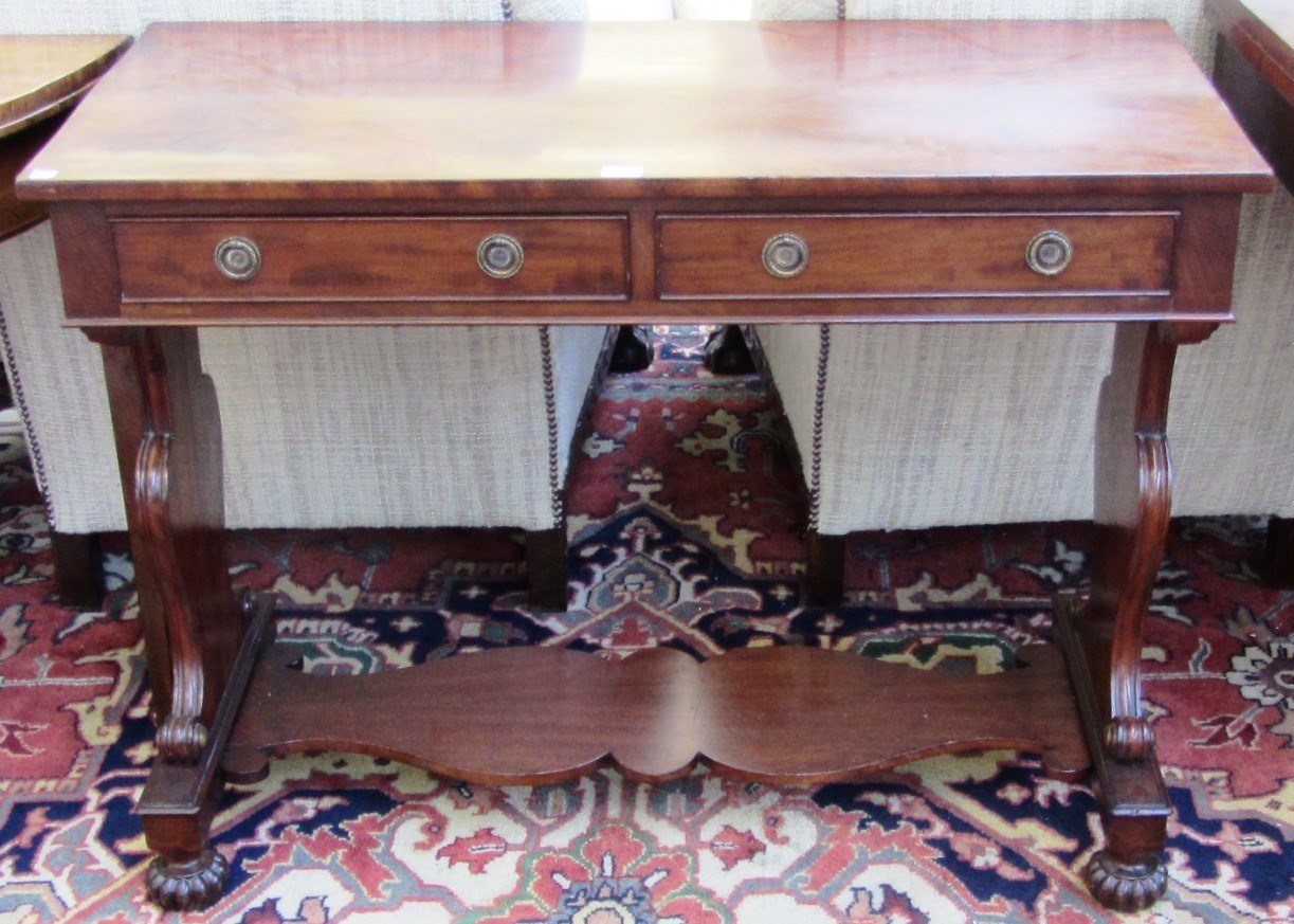 Appraisal: A William IV mahogany two drawer side table on trestle