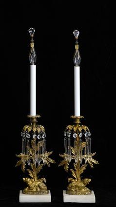 Appraisal: PAIR OF VICTORIAN GILT-METAL CANDLESTICKS MOUNTED AS LAMPS Each modeled