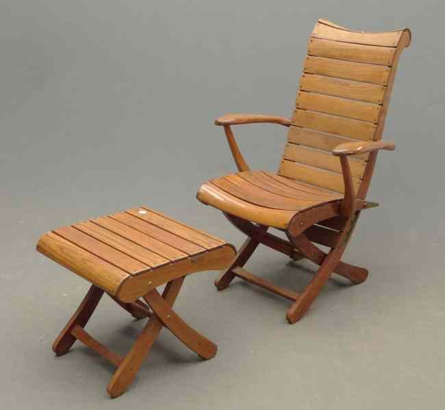 Appraisal: Slat chair with ottoman Provenance Myron Goldfinger Collection