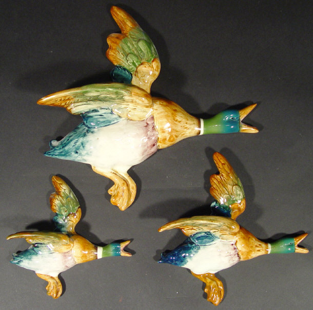 Appraisal: Graduated set of three Beswick mallard wall plaques each with