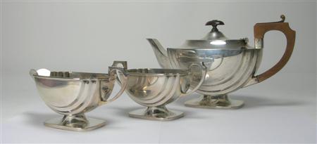 Appraisal: A three-piece teaset E W Haywood Birmingham rectangular pedestal form