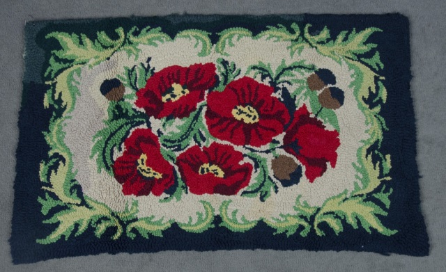 Appraisal: Colorful Hooked Rug with Red PoppiesSecond half of th century