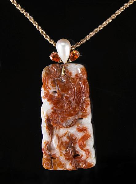 Appraisal: Carved Russet Jade Orange Sapphire and Pearl Pendant By George