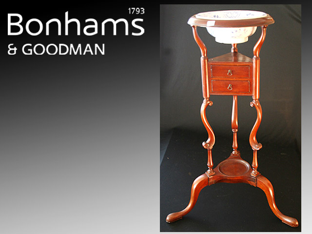 Appraisal: A pedestal washing stand in mahogany the circular top fitted