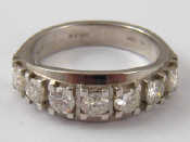 Appraisal: An carat white gold seven stone diamond ring estimated total