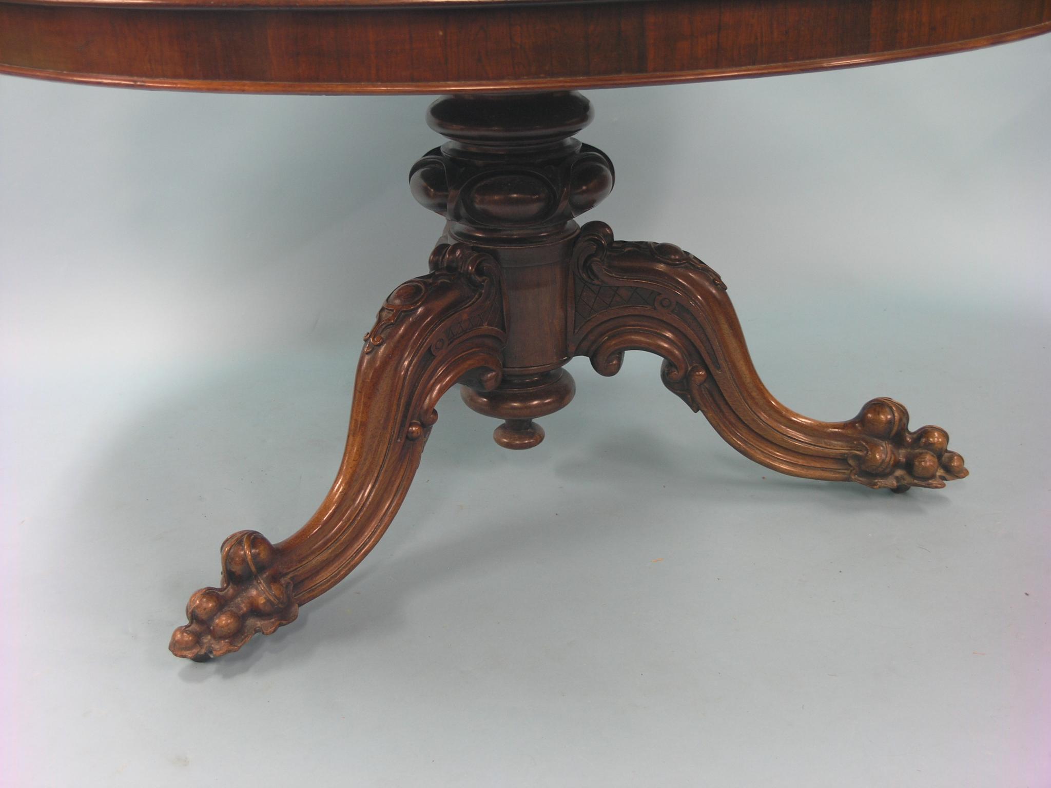 Appraisal: An early Victorian rosewood breakfast table circular top tilting upon