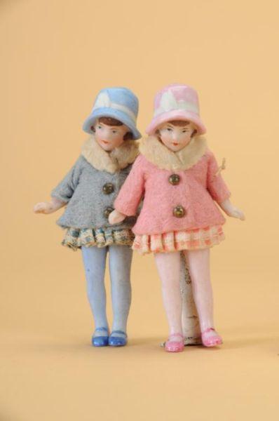 Appraisal: Pair of Hertwig Dolls with Molded Bonnets Germany ca a