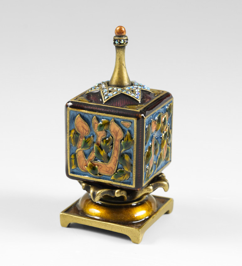 Appraisal: JAY STRONGWATER ENAMELED DREIDEL Signed Jay Strongwater and dated enameled