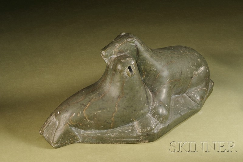 Appraisal: Inuit Soapstone Carving depicting a bear attacking a walrus lg