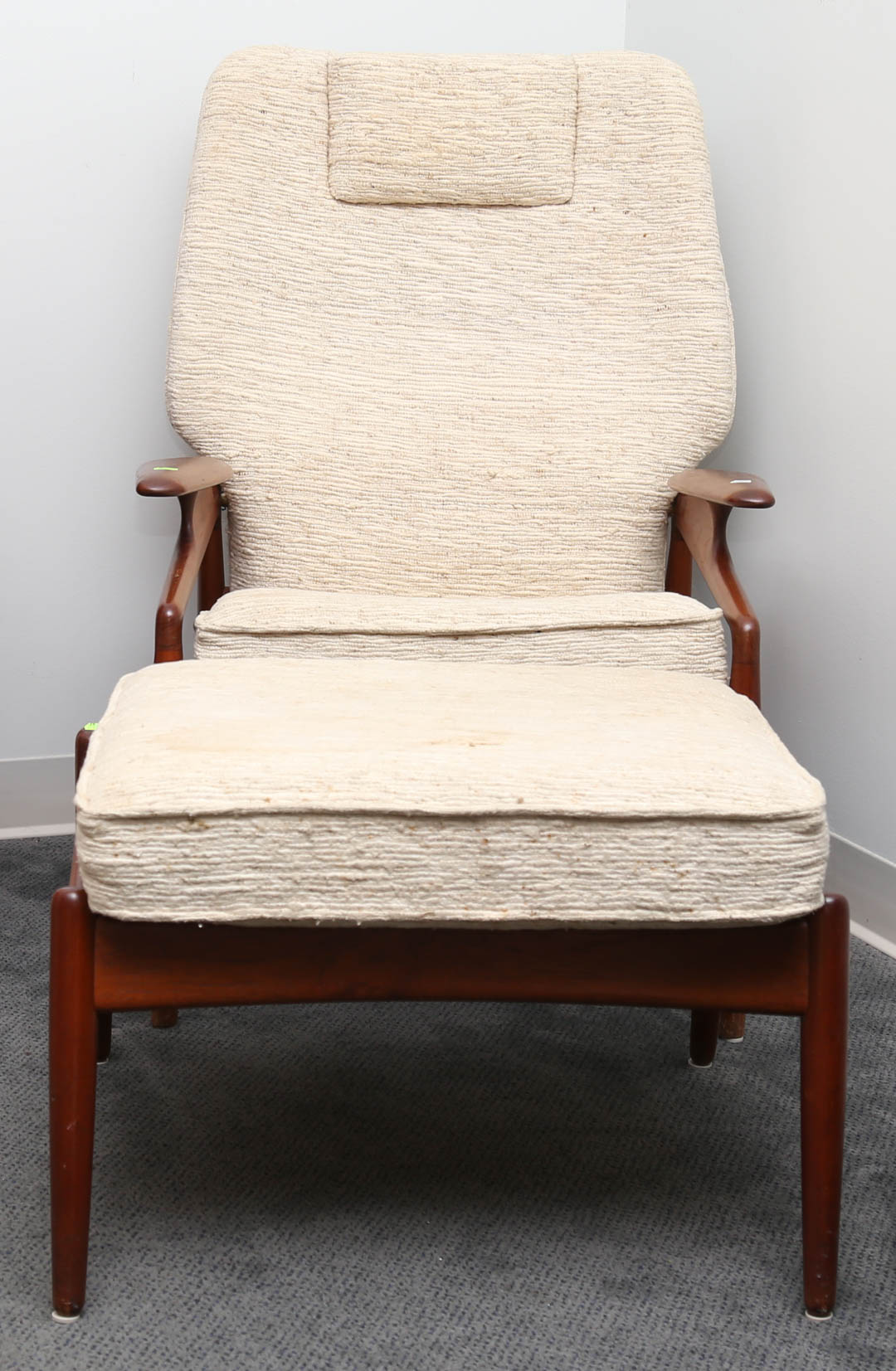 Appraisal: Mid-century sliding armchair with ottoman