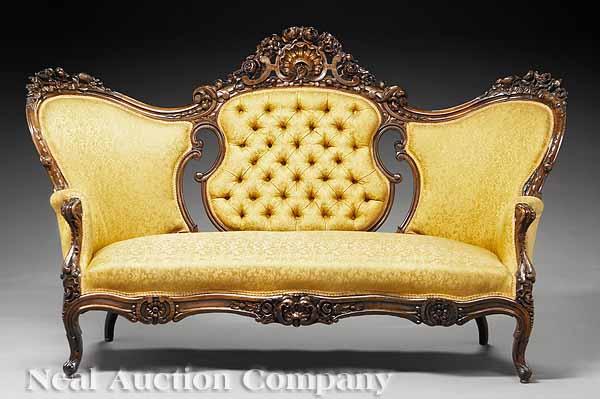 Appraisal: An American Rococo Carved Rosewood Triple Back Sofa mid- th