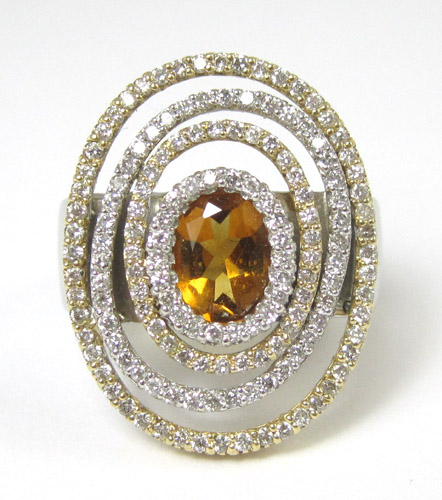 Appraisal: ORANGE SAPPHIRE AND DIAMOND RING k white and yellow gold