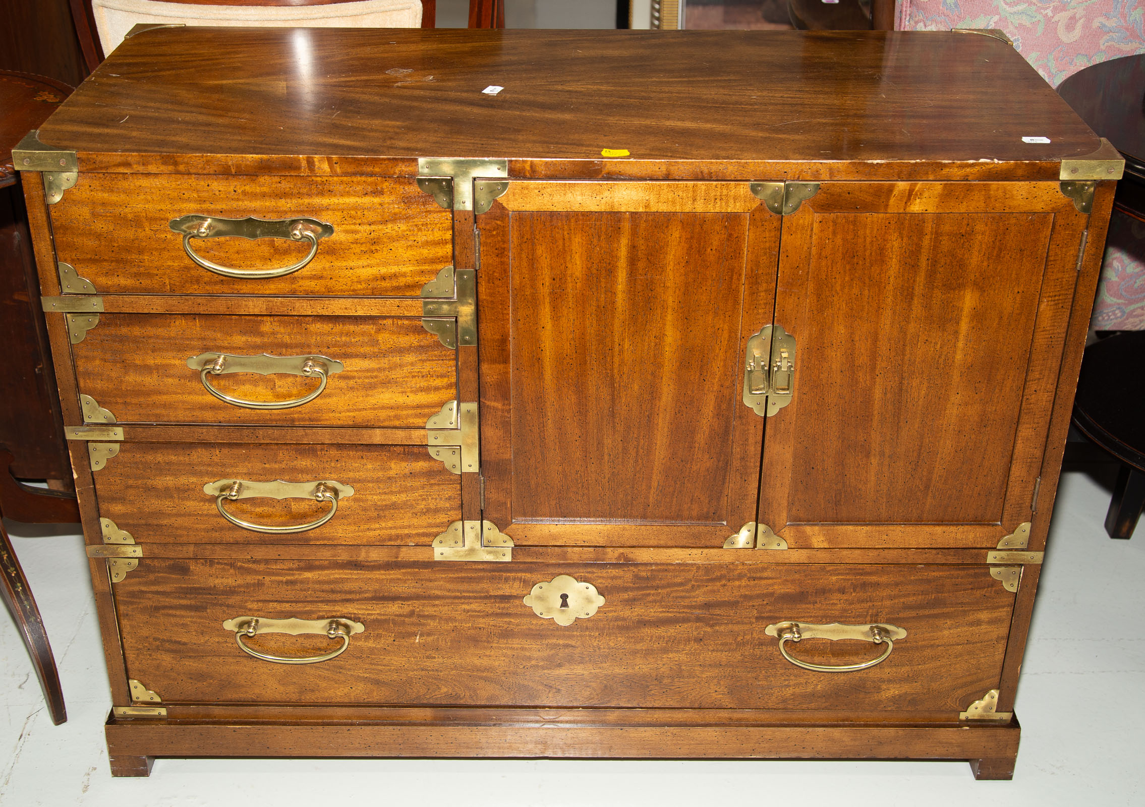 Appraisal: CENTURY CHINES-INSPIRED CABINET Circa antiqued teak with bright brass mounts