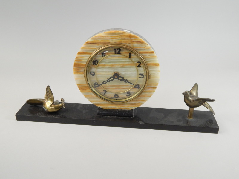 Appraisal: A French onyx Art Deco period mantel clock applied with