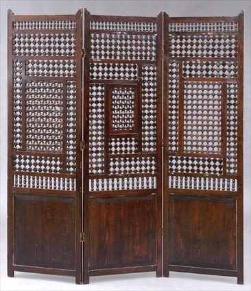 Appraisal: MOORISH CARVED WOOD THREE-FOLD SCREEN Each fold with pierced spindle