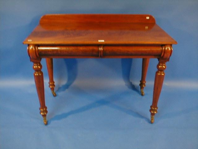 Appraisal: A Victorian flamed mahogany side table with moulded top two