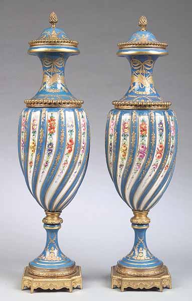 Appraisal: A Pair of Antique S vres-Style Celeste Bleu Lidded Urns