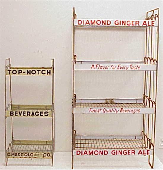 Appraisal: Two metal in-store soda advertising display racks one for Diamond