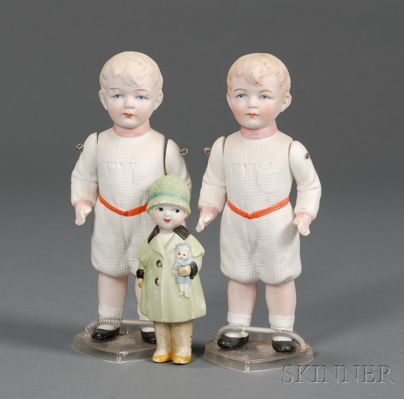 Appraisal: Three All-Bisque Dolls Germany and Japan th century pair of