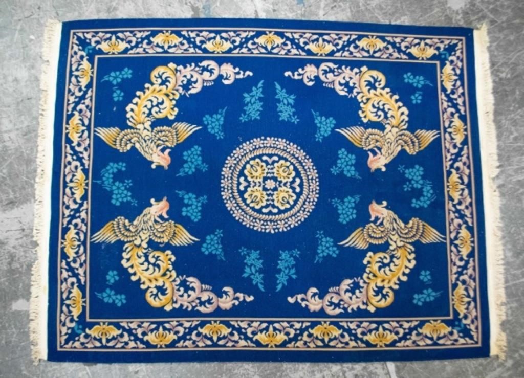 Appraisal: Chinese rug with floral medallion center motif four cockatrices shamrock