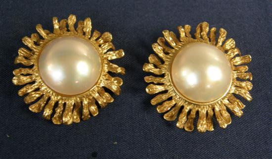 Appraisal: Pair of yellow metal pearl set sunburst clip on earrings