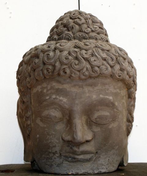 Appraisal: A large terracotta Buddha's head cm tall