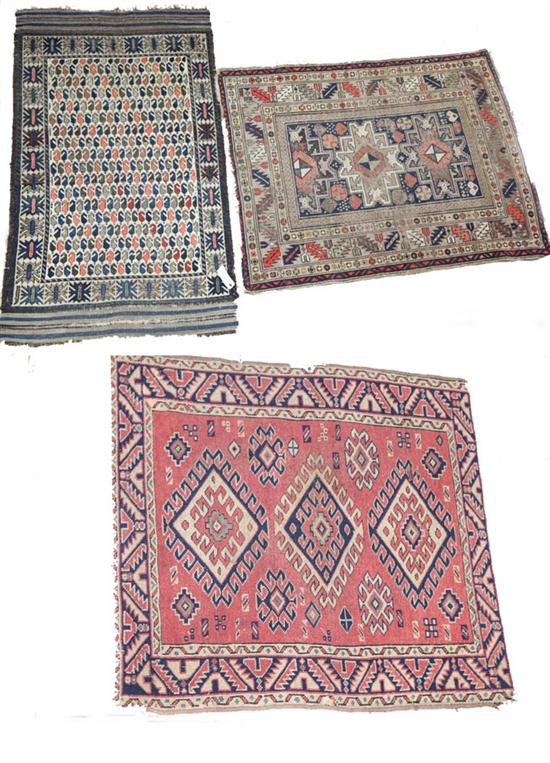 Appraisal: THREE HAND KNOTTED ORIENTAL RUGS Caucasian Gendje rug first quarter