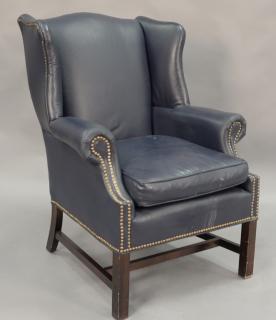 Appraisal: Chippendale style blue leather wing chair Chippendale style blue leather