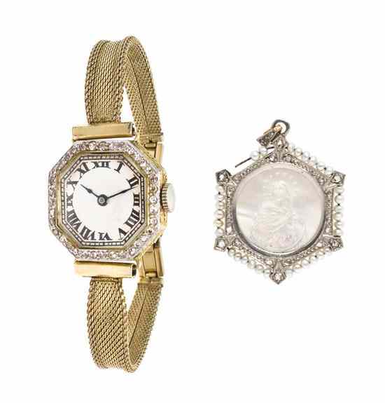 Appraisal: An Edwardian Platinum Topped Gold and Diamond Mechanical Wristwatch x