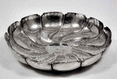 Appraisal: An early th Century silvery metal circular strawberry dish of