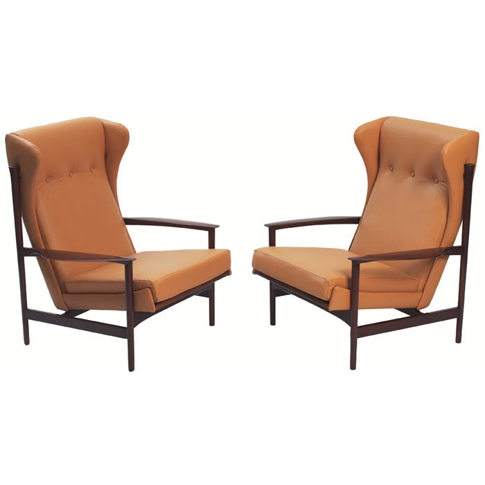 Appraisal: Selig Danish Modern high-back lounge chairs pair walnut frames with