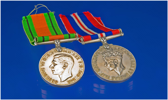 Appraisal: Two World War II Medals Defence and Service