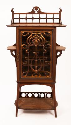 Appraisal: An Art Nouveau music cabinet the glazed doors overlaid with