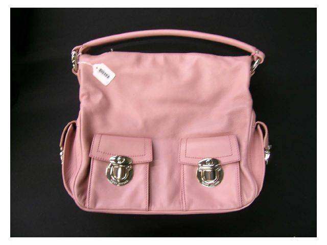 Appraisal: Rose leather Marc Jacobs handbag with four exterior snap closure