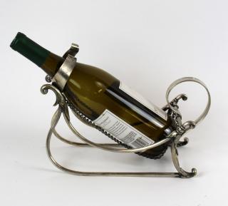 Appraisal: French silverplate wine bottle holder French silverplate wine bottle holder