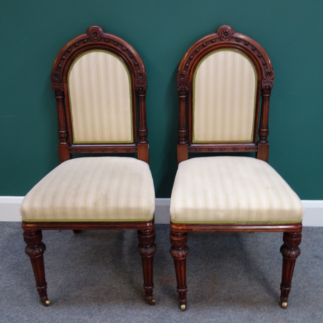 Appraisal: A set of eight late Victorian walnut dining chairs each