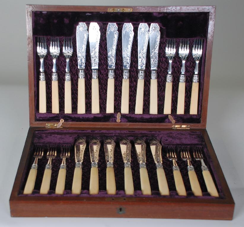 Appraisal: SET OF TWELVE PAIRS OF VICTORIAN SILVER FISH KNIVES AND