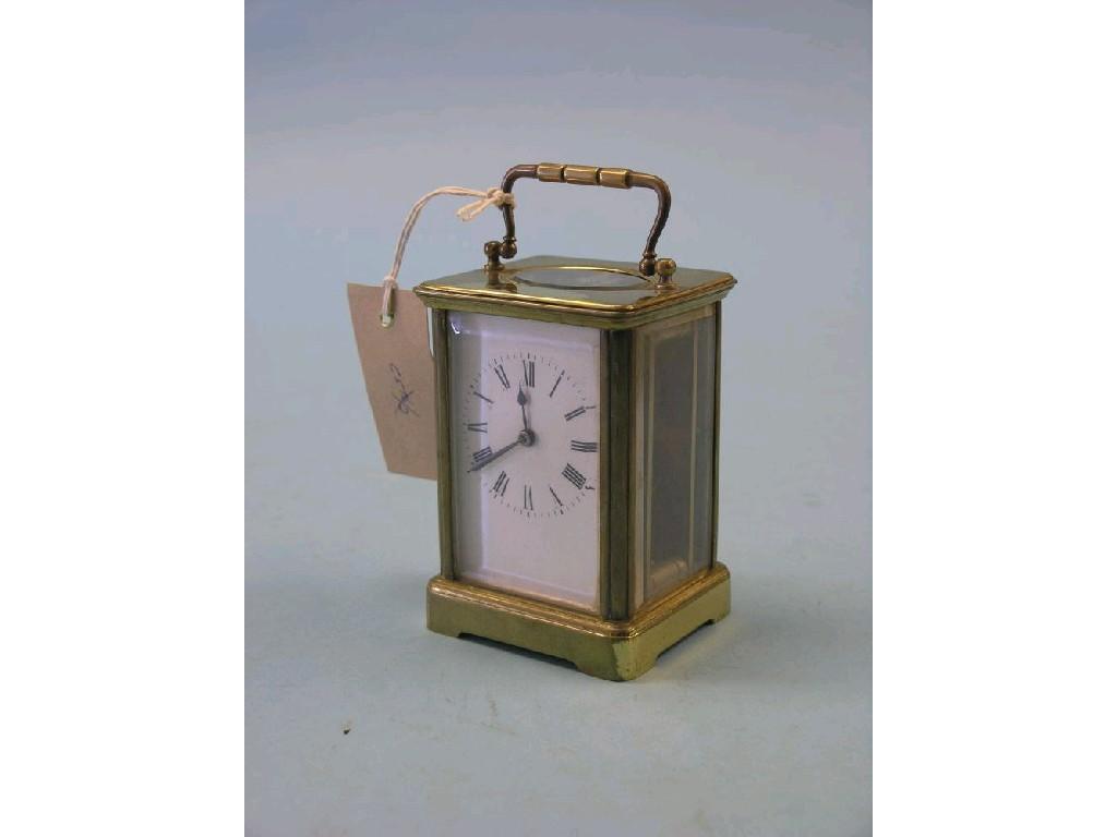 Appraisal: A carriage clock by Margaine enamelled dial with timepiece movement