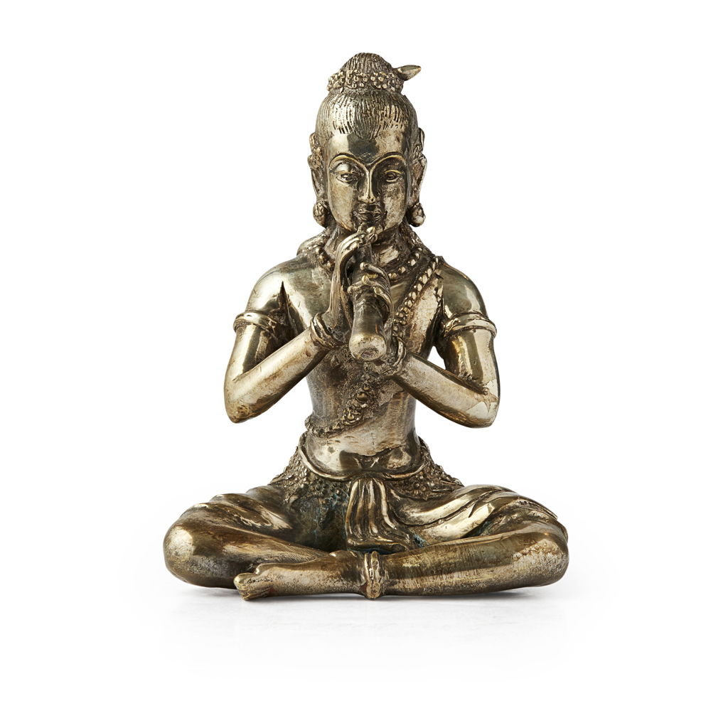 Appraisal: INDIAN SILVERED BRONZE FIGURE OF A MUSICIAN the figure shown