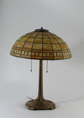 Appraisal: A Tiffany studios bronze table lamp with matched Geometric glass