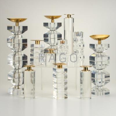 Appraisal: LUCITE Group of eleven candlesticks USA s Lucite brass chrome