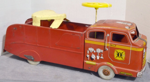 Appraisal: Marx Ride-On Fire Truck high x long Some fine surface