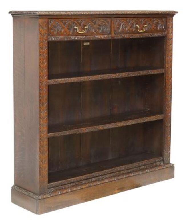 Appraisal: English carved oak bookcase retailed by Kendal Milne Company Deansgate