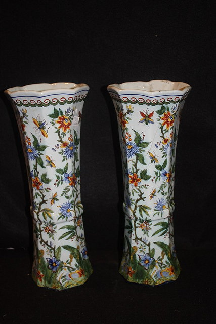 Appraisal: A PAIR OF DELFT POLYCHROME TAPERING OCTAGONAL VASES each with