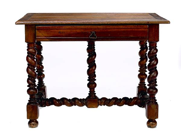 Appraisal: A Portugeuse Baroque style oak writing table height in width